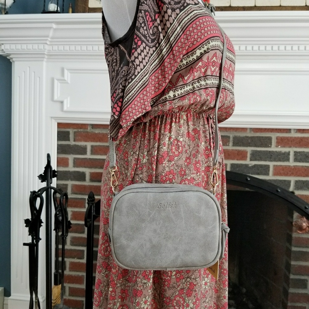 New Bolish crossbody bag. PU leather in Grey with gold-tone hardware.